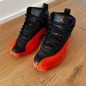Air Jordan 12 Reverse Taxi “Brilliant Orange”